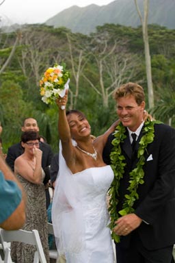 Honolulu Wedding Ceremony photography. Photo of bride and groom walking down the aisle.